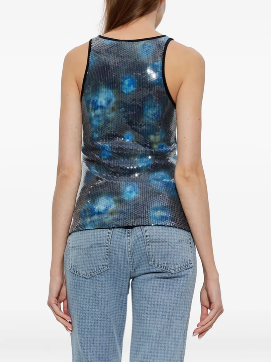 blue top worn by a person, showing the top fit