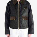 Black jacket worn by a person, showing the jacket fit