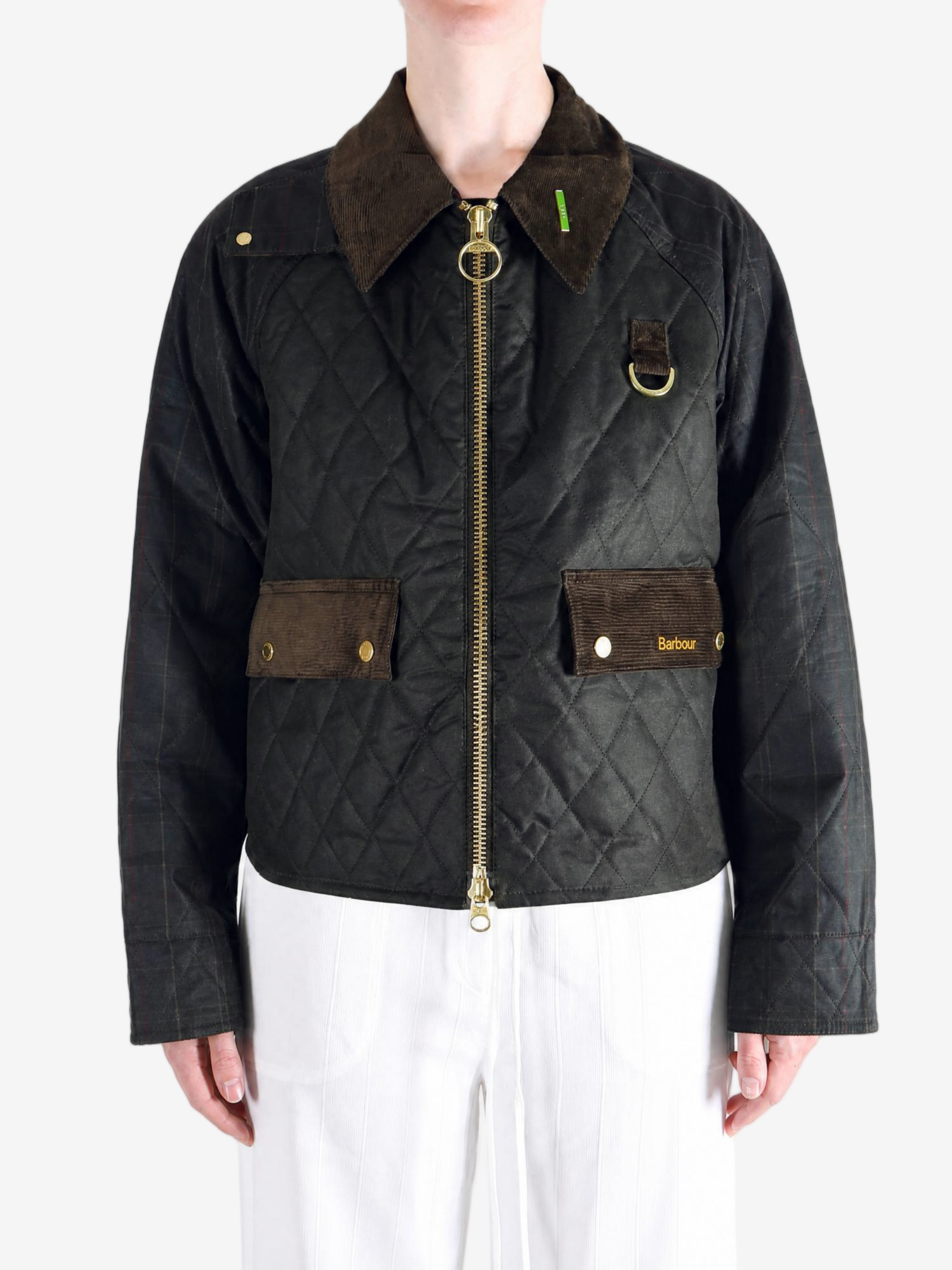 Black jacket worn by a person, showing the jacket fit