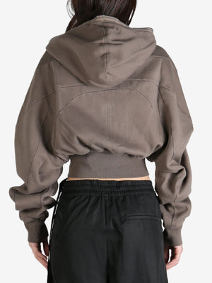 Dust hoodie worn by a person, showing the hoodie's fit