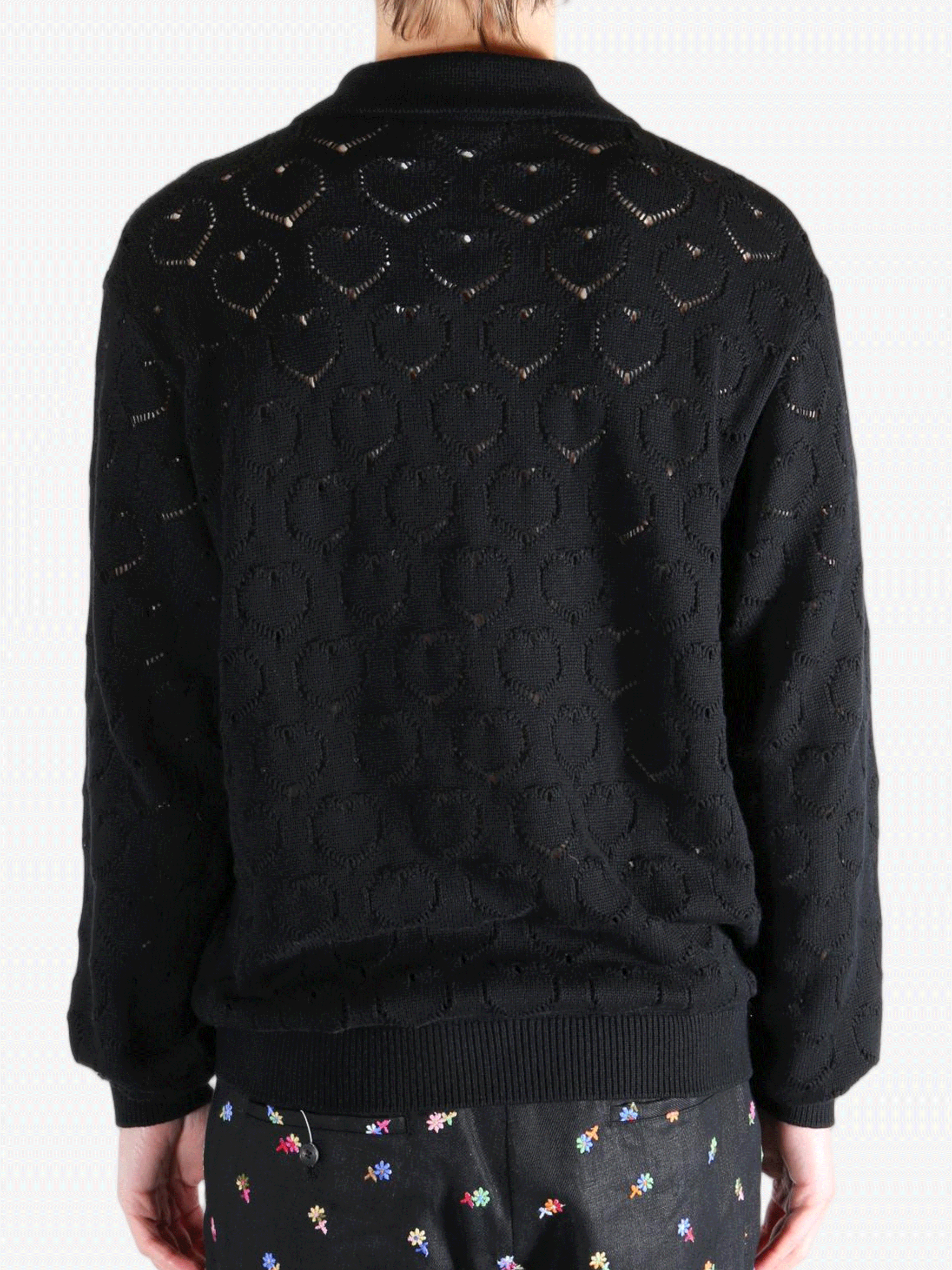 Black jackets worn by a person, showing the jackets fit