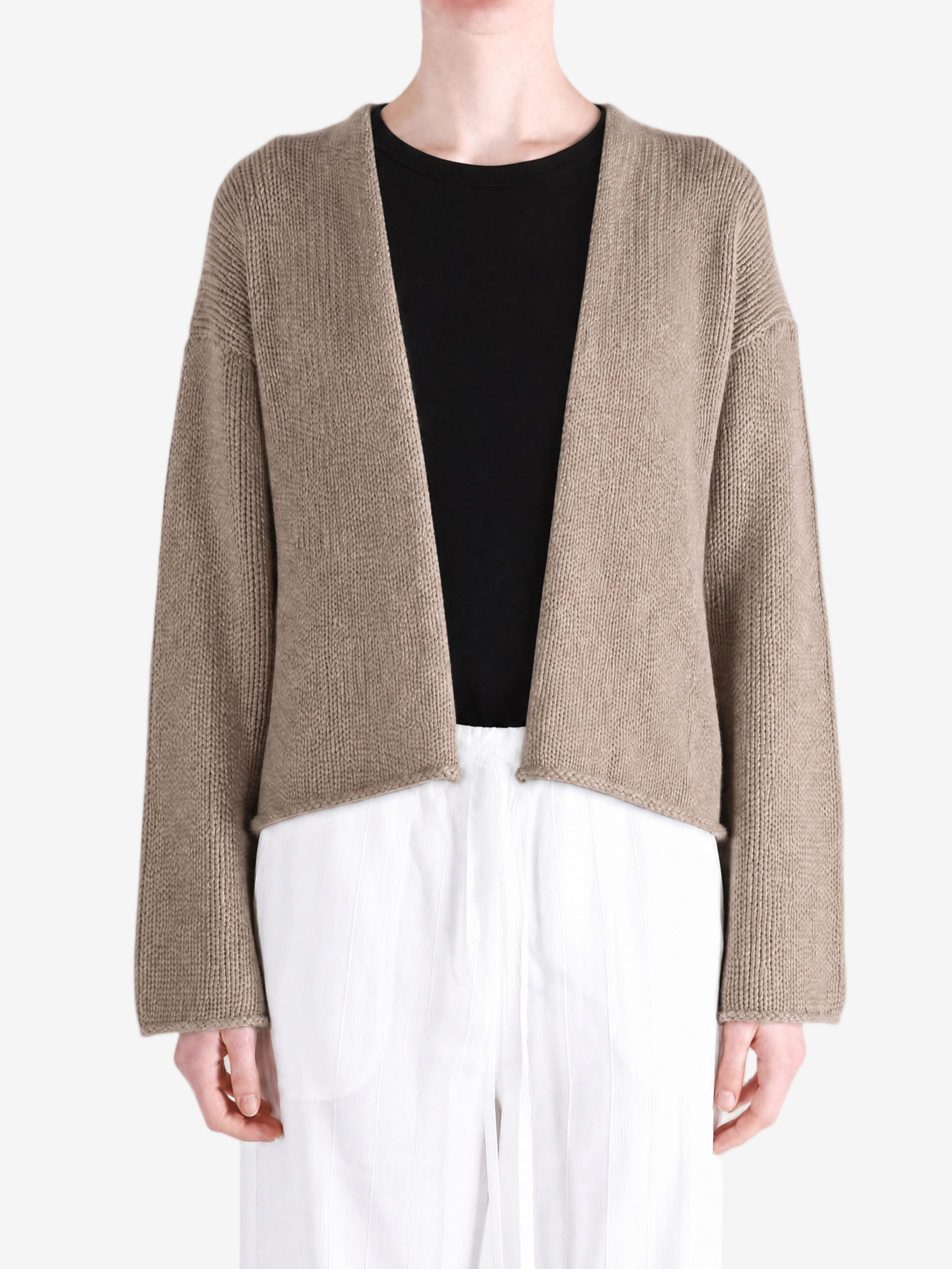 Tan jacket worn by a person, showing the jacket fit