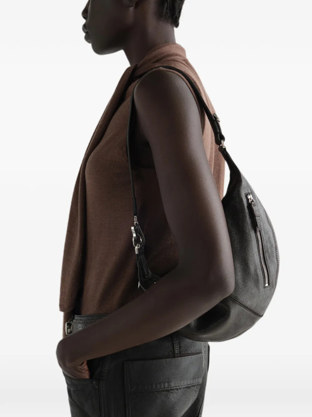 Brown bag worn by a person, showing the bag fit