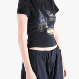 Black t-shirt worn by a person, showing the t-shirt's fit