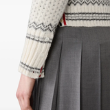 Close up of white knitwear, showing texture of the Wool fabric