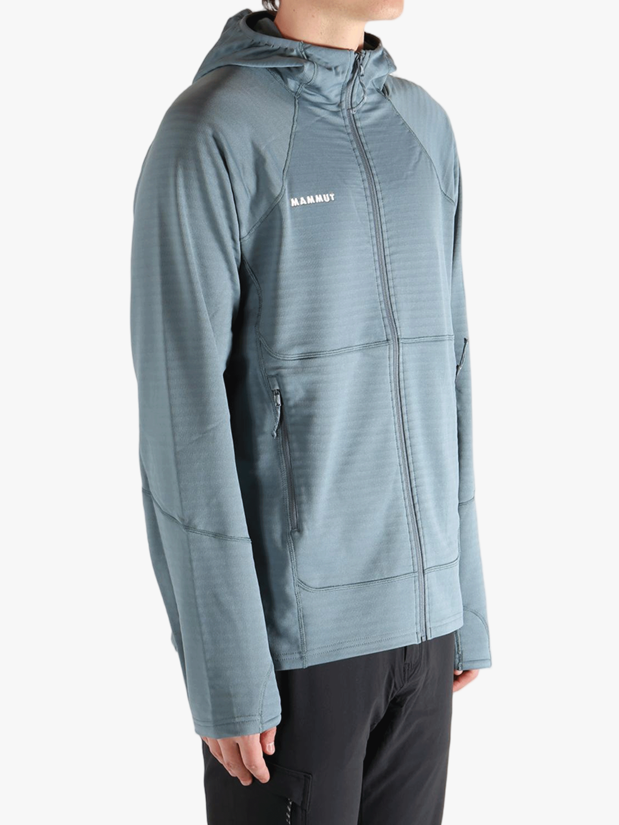 Blue jacket worn by a person, showing the jacket's fit