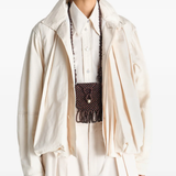 Brown bag worn by a person, showing the bag fit
