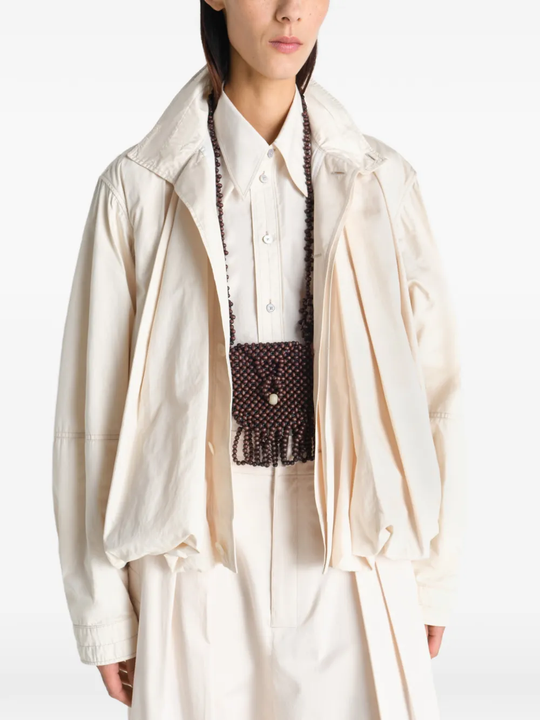Brown bag worn by a person, showing the bag fit