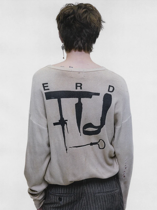 Tan t-shirt worn by a person, showing the t-shirt fit