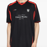 Black t-shirt, worn by a person, showing the t-shirt fit