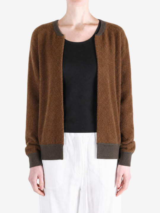 Brown jacket worn by a person, showing the jacket fit