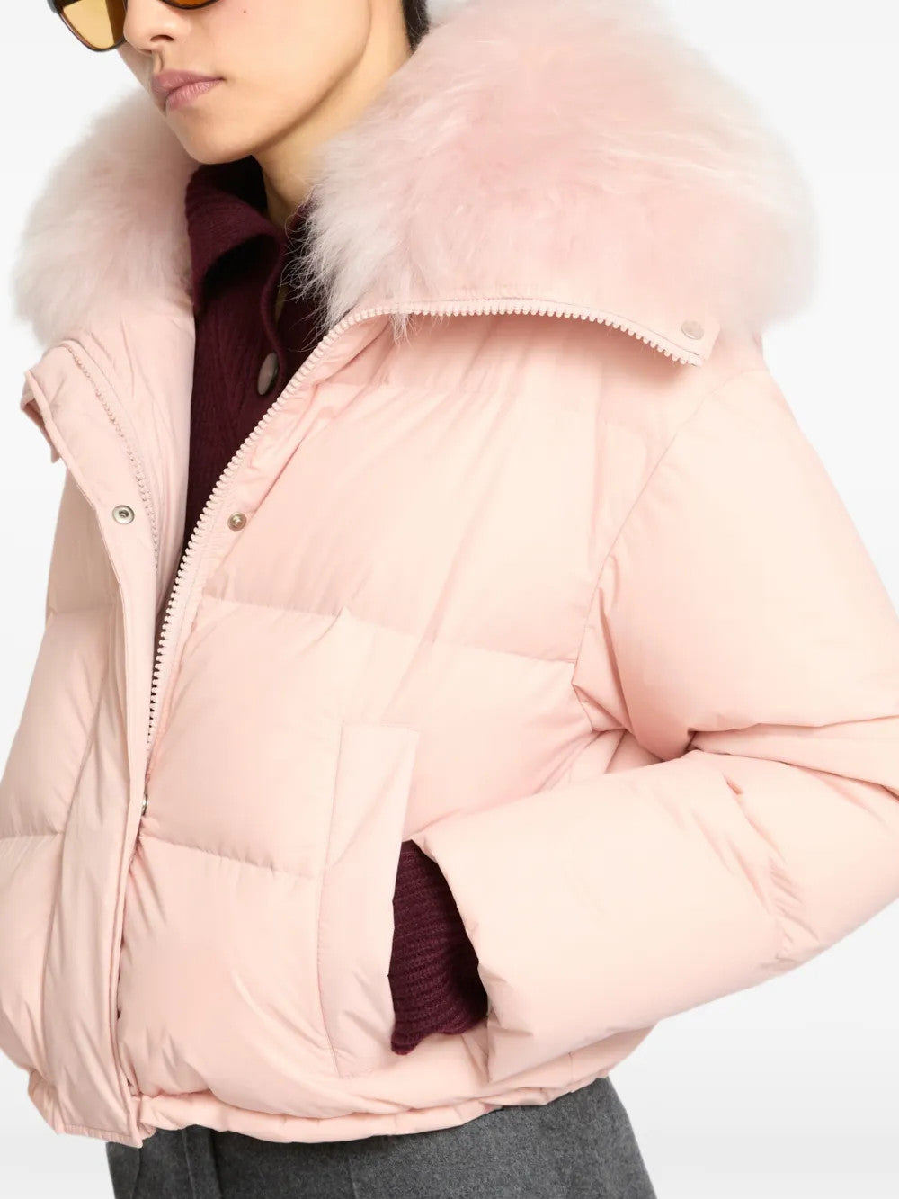 Pink jacket worn by a person, showing the jacket fit
