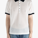 White shirt worn by a person, showing the shirt fit