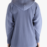 Blue jacket worn by a person, showing the jacket's fit