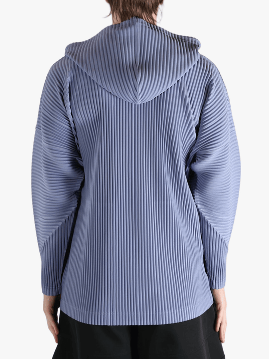 Blue jacket worn by a person, showing the jacket's fit