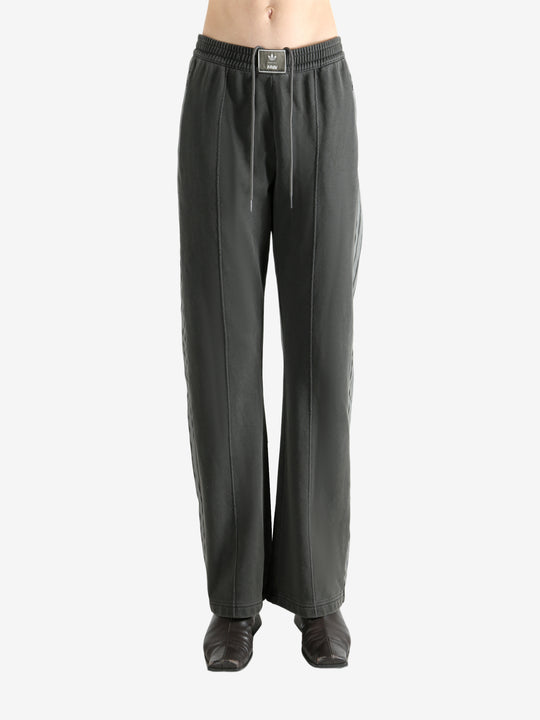 Grey pants worn by a person, showing the pants' fit