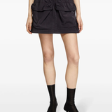 Black skirt worn by a person, showing the skirt fit