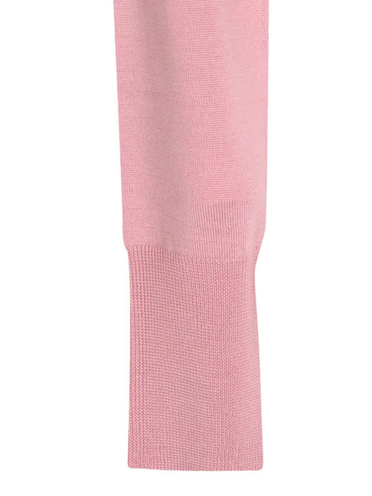 Close up of Pink knitwear, showing texture of the 100% wool fabric