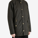 Green jacket worn by a person, showing the jacket fit