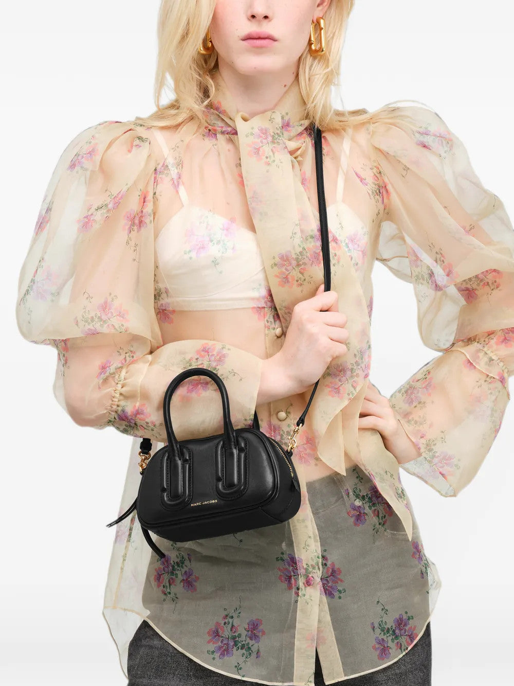 Black bag worn by a person, showing the bag fit