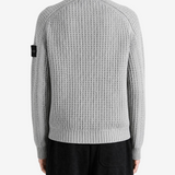 Grey knitwear, front view