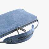 Close up of the blue bag, showing texture of the cotton fabric