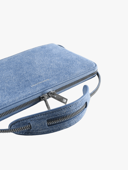 Close up of the blue bag, showing texture of the cotton fabric