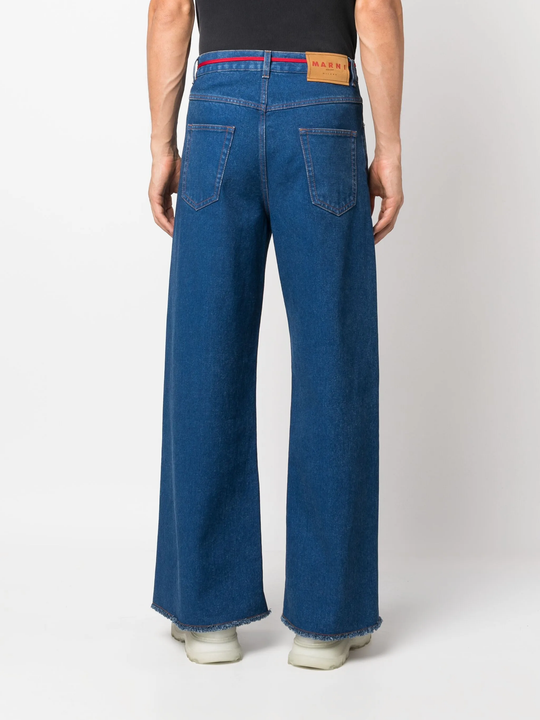 blue jeans worn by a person, showing the jeans fit