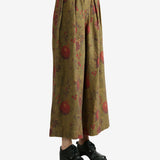 Tan pants worn by a person, showing the pants' fit