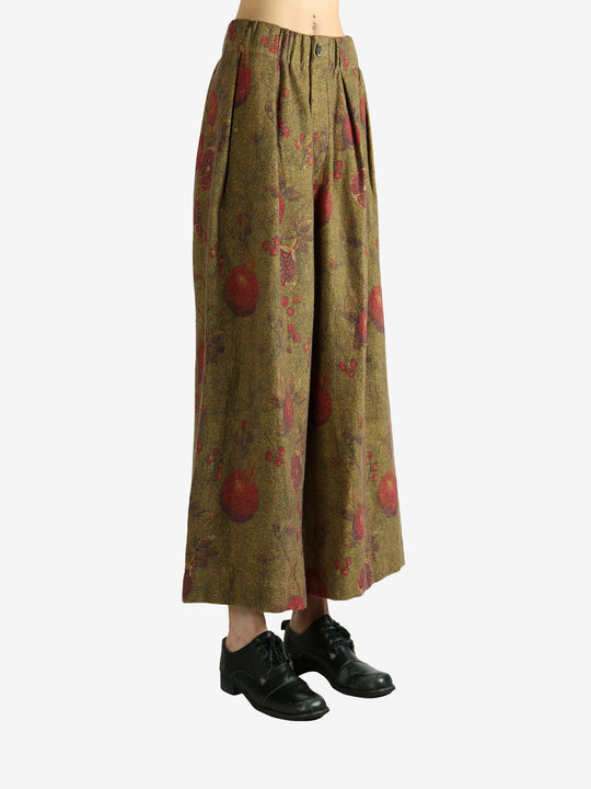 Tan pants worn by a person, showing the pants' fit