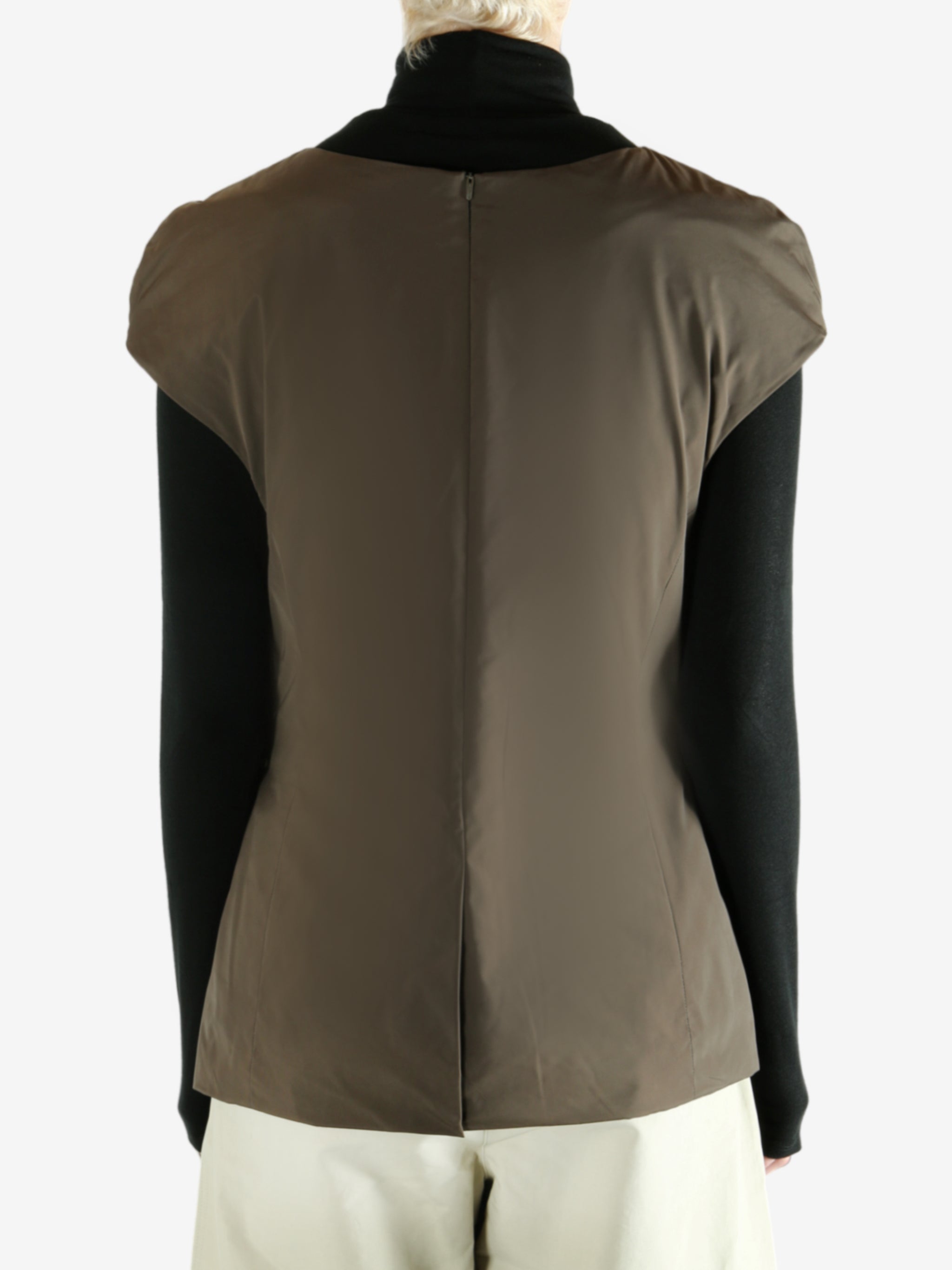 Brown dress worn by a person, showing  the dress's fit