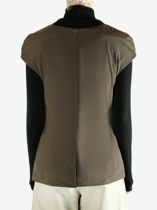 Brown dress worn by a person, showing  the dress's fit