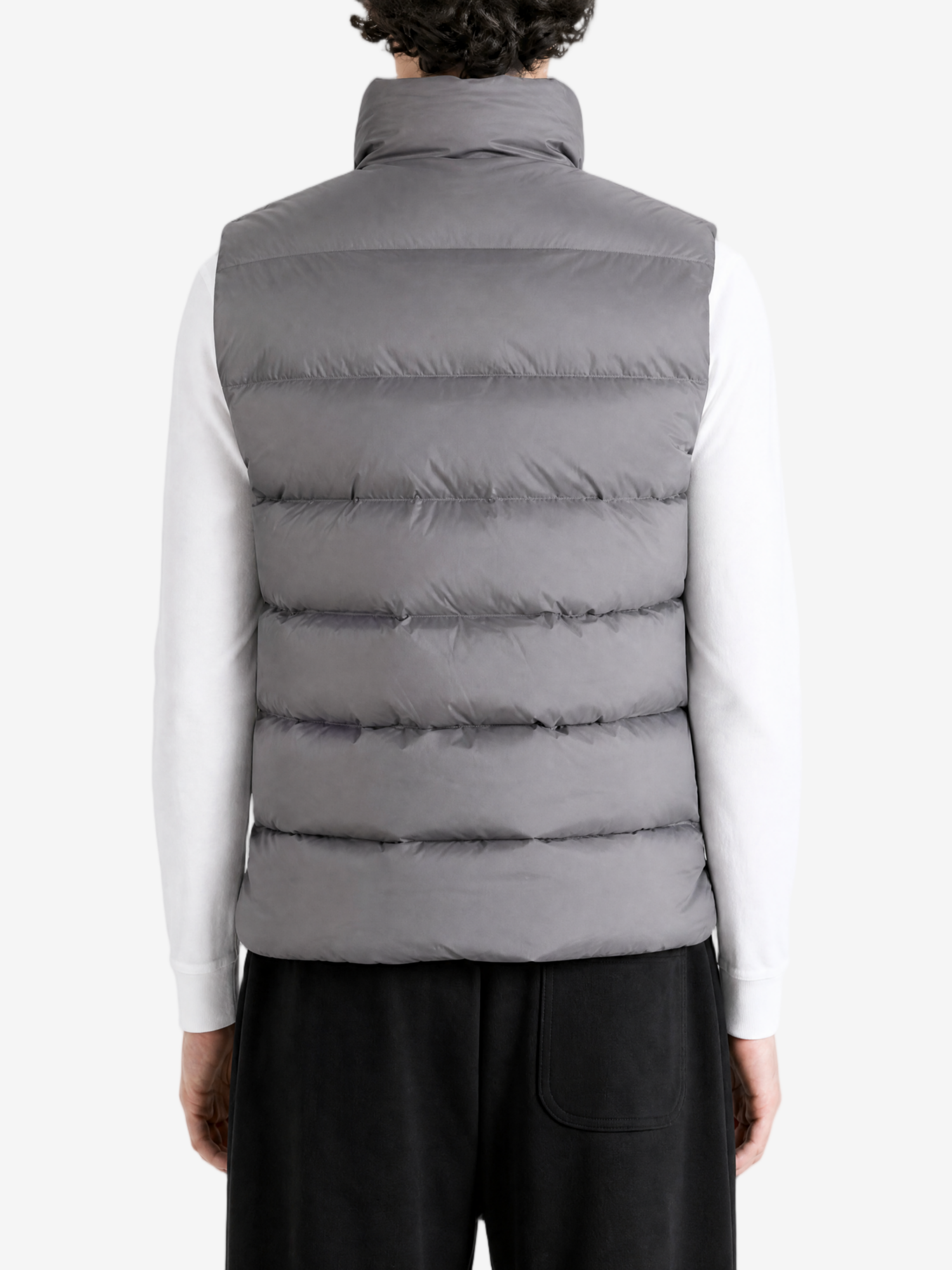 Grey jacket worn by a person, showing the jacket fit