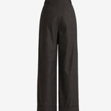 Brown pants worn by a person, showing the pants fit
