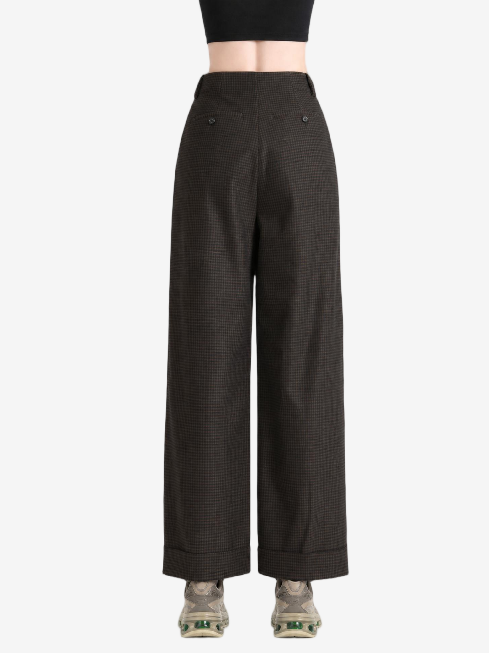 Brown pants worn by a person, showing the pants fit