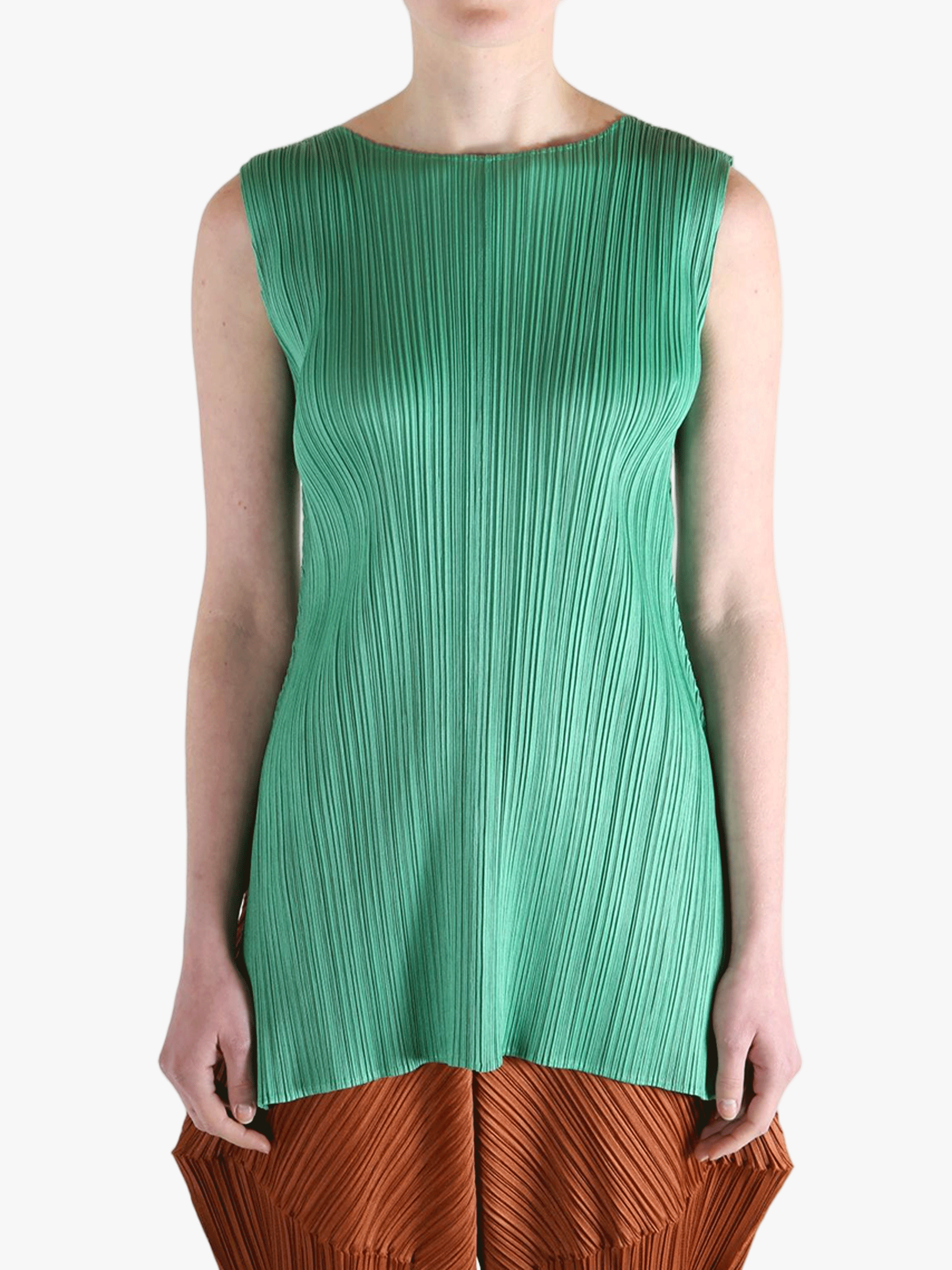 Green dress worn by a person, showing the dress's fit
