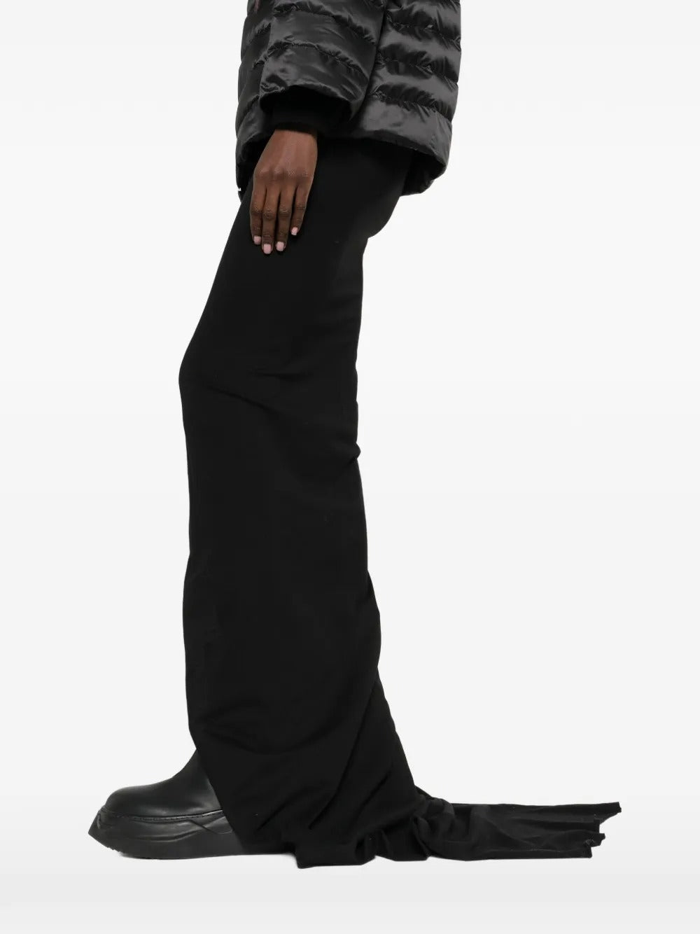 Black skirts worn by a person, showing the skirts fit