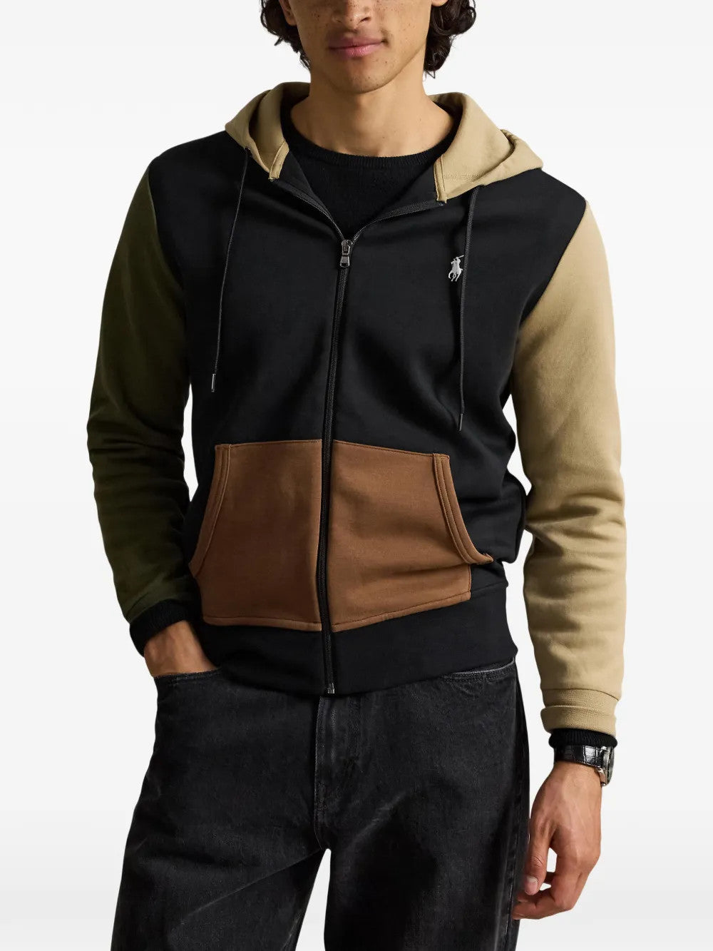 Black hoodie worn by a person, showing the hoodie fit