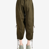 Green pants, full body view