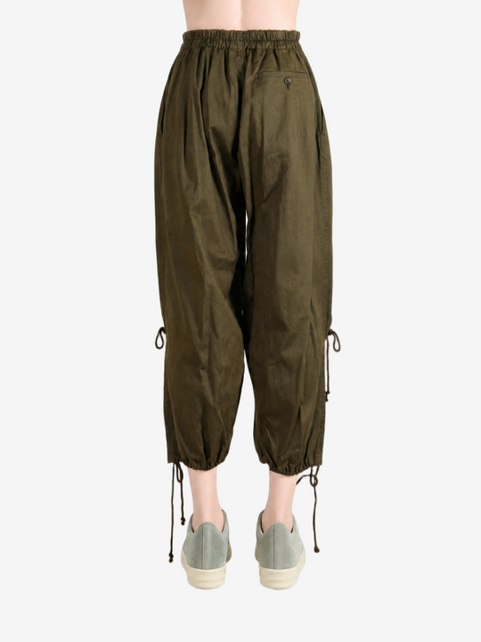 Green pants, full body view