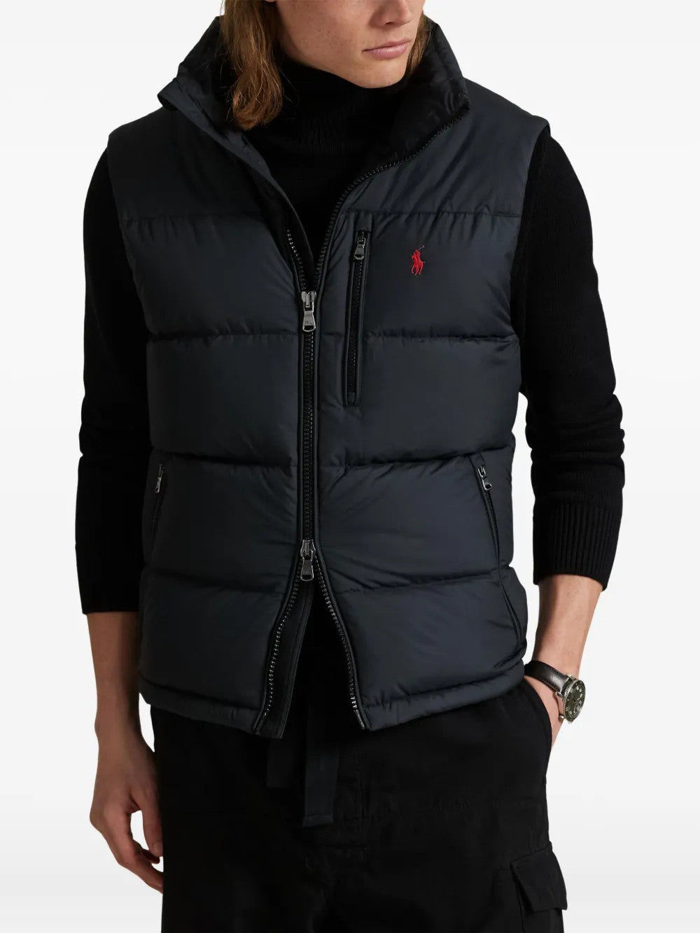Black jacket worn by a person, showing the jacket fit