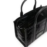 Close up of the black bag, showing texture of the polyurethane fabric