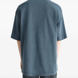 Blue t-shirt worn by a person, showing the t-shirt's fit