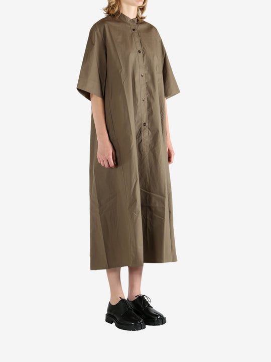 Brown dress worn by a person, showing the dress's fit