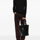 Black knitwear, full body view