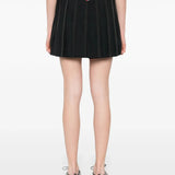 Black skirt worn by a person, showing the skirt’s fit