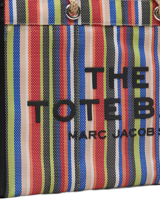 Close up of the red bag, showing texture of the PVC fabric