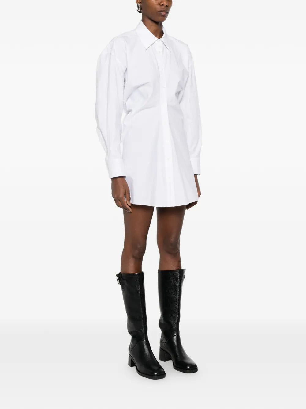 White shirts worn by a person, showing the shirt's fit