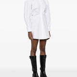 White shirts worn by a person, showing the shirt's fit