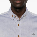Blue shirt worn by a person, showing the shirt fit